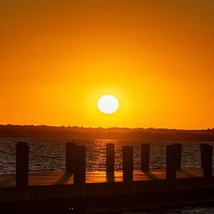 Sunset Over Water Canvas Art